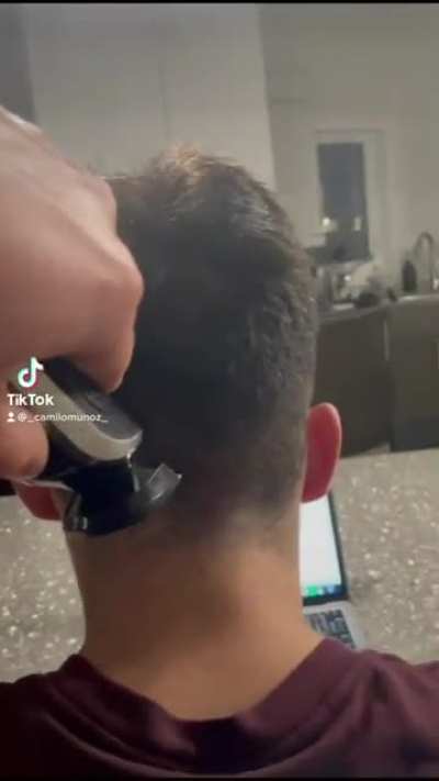 Trying to ruin his haircut