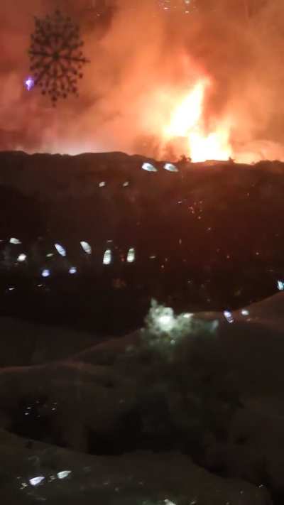 Courageous firefighters extinguishing a SUV fire at minus 25 celcius (in front of my house)