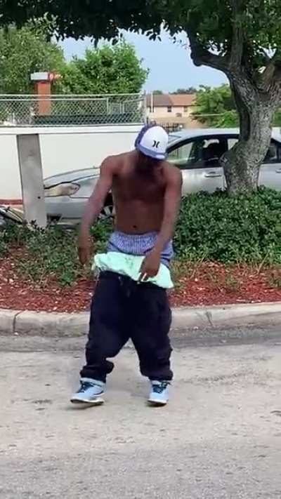 An fake Crip Gang member, can't even crip walk.