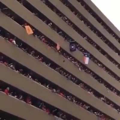 His hat fell off. So they helped to get it back.