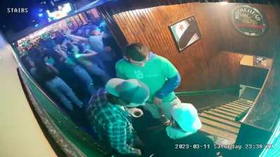 Mercyhurst University hockey player pushing a disabled student&rsquo;s wheelchair down a flight of stairs while she&rsquo;s using the bathroom