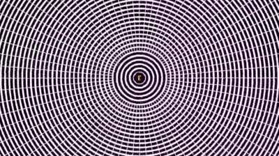 This video is designed to create a natural hallucination based on the motion aftereffect illusion