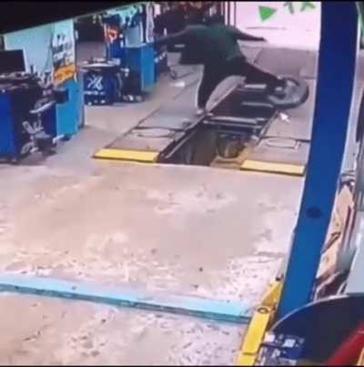 Man trips on tire, man avenges for tire existence and knocks the tire&rsquo;s mate away using same tire