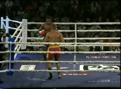 "The Flying Gentleman" Remy Bonjasky uses a flying headkick to knockout Vernon White