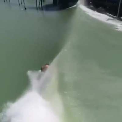 Riding under the wave
