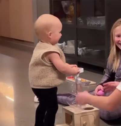 Big sisters overjoyed to see baby brother&rsquo;s first steps