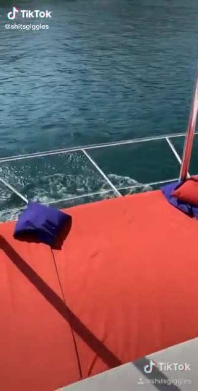 DBS jumping off the boat