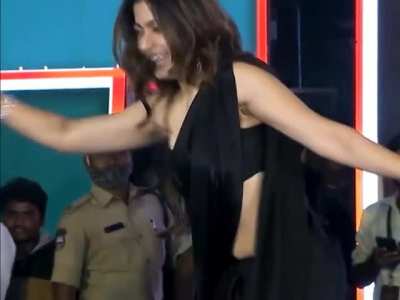 Rashmika Mandanna Bending Down to Dance but My Eyes are Fixated in her Right Tit which is trying hard to come out of Blouse while Navel Peeking through Saree. Missing Behind shot of this one as her Twerking Ass would be a Delight to Watch