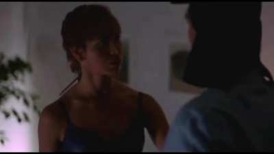 Kim Kopf Seduces a Man Only to Knee Him in the Balls in Prison Planet (1992)