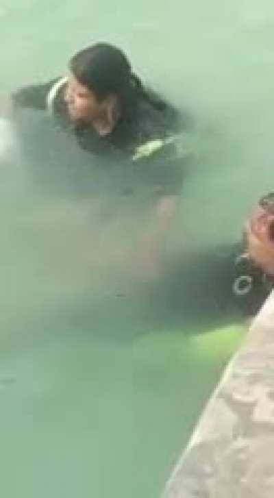 getting jerked off by his wife in a public pool