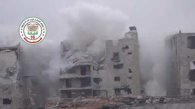 FSA 16th Division "Hell Cannon" strikes on a Syrian Army controlled building - Aleppo - 12/13/2014