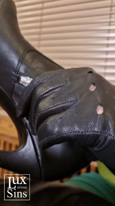 Thigh High Black Leather Boots and Fishnets