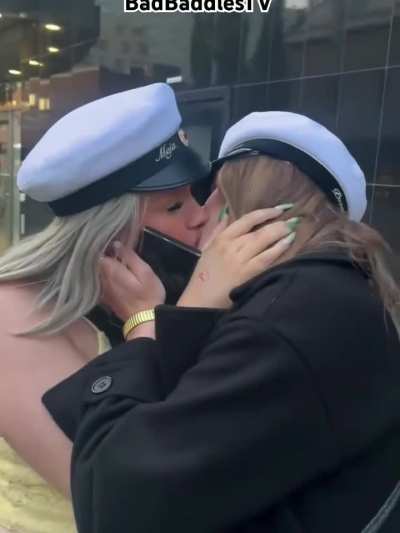 Blonde girls kiss