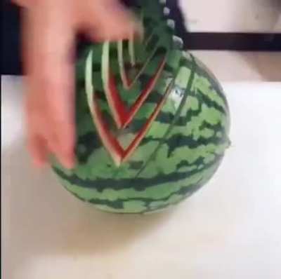 The way he cuts this watermelon