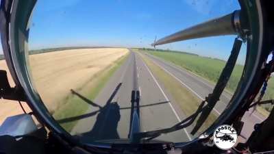 UA POV: Ukrainian Mi-24 attack helicopter pilot "Apostel" filmed one of his recent flights. To avoid Russian radar he flew very low over a public road 