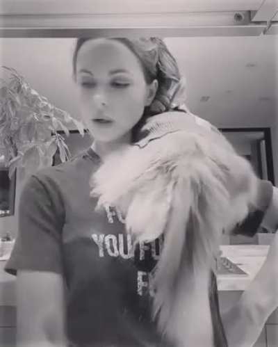 Kitty on her shoulder