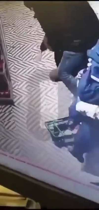 Old man knocks a random kid out in a store
