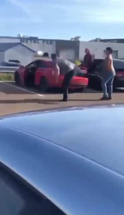 Dude goes mortal kombat mode in a community college parking lot