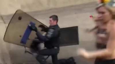 Arresting topless women