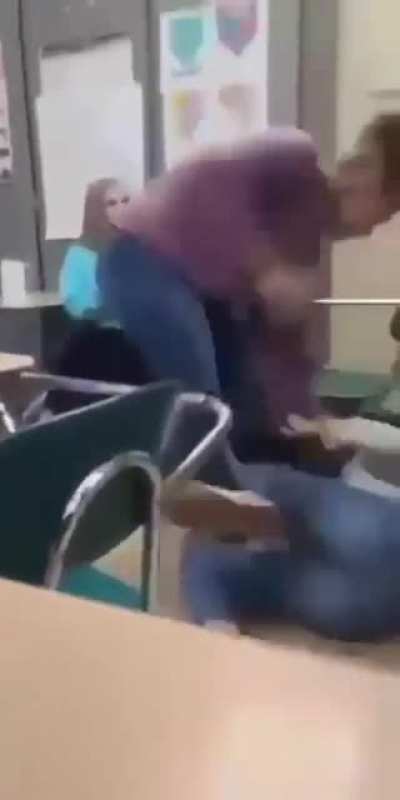 The girl on the ground was mocking the girl on tops glasses of so she decided she was done with her BS