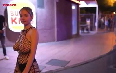 Turning heads with the braless fishnet top