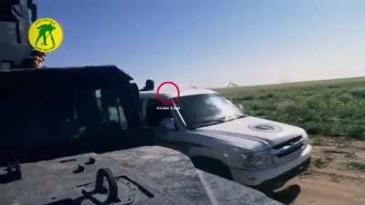 Iraqi popular mobilization forces humvee gets slammed by a bug shrapnel coming from a VBIED explosion.