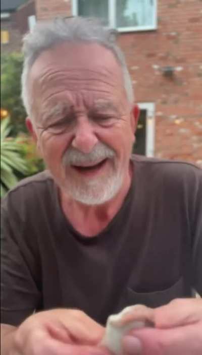 British man eating surstr&ouml;mming