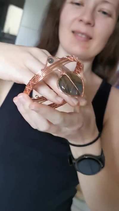 A leaf armband I made with copper wire and a pair of gemstones.