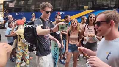Man eats kabob in front of animal rights activists in Manhattan, NY today