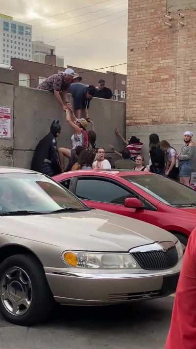Literal superhero assisting those fleeing an active shooter situation in downtown Salt Lake City