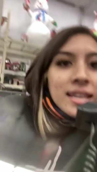 She's using the PA system to quit her shitty Walmart job