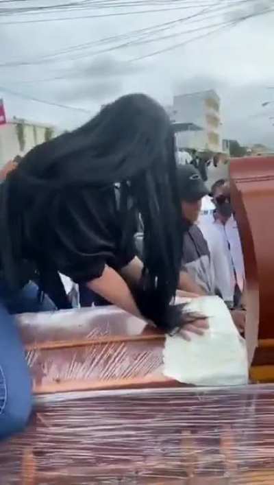 Woman Twerking on Boyfriend`s Casket