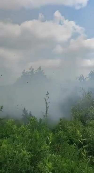 Ukranian military firing MLRS from a pickup truck donated by NAFO