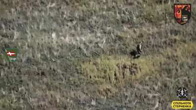 Ukrainian 14th Mechanized Brigade's "Charon" UAV team targeted a Russian infantryman with an FPV strike drone, initiating a foot chase that continues for some time before the drone operator lands a close strike