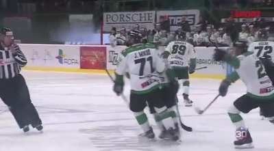 HK Nitra’s goalie Matt O’Connor slashes an opposing player who ran into him moments before