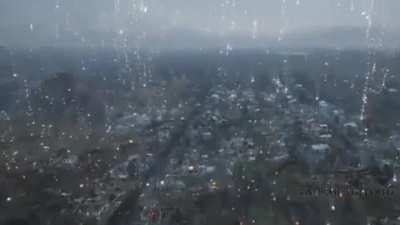 Horrifying drone footage of an indiscriminate attack by Russian forces against a Ukrainian town of 9000 inhabitants. Each tiny dot of light represents a phosphorus munition with a temperature up to 3,000&deg;C.