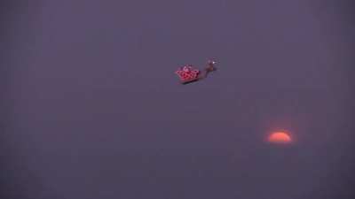 Drone decorated to look like Santa's sleigh flying over the city