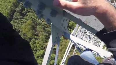 Climbing down a big pylon