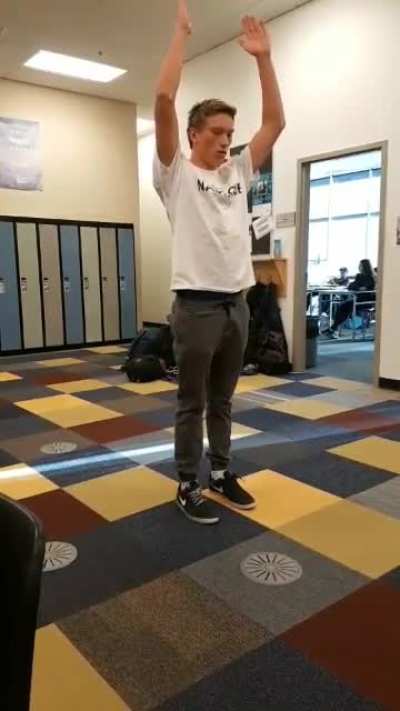 Trying a backflip in school