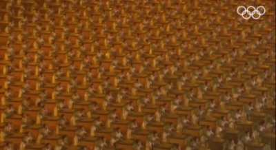 The sound of 2008 people drumming to the same beat.