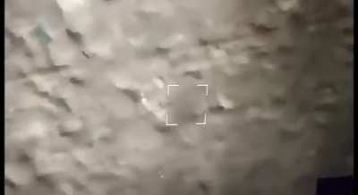 A Russian recon drone watches as a Russian FPV drone hits a Ukrainian drone