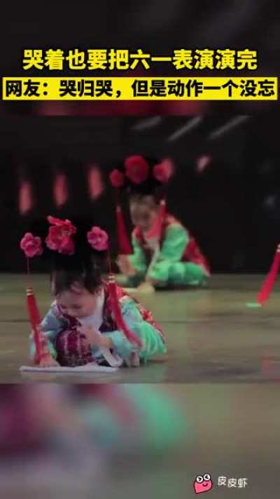 The little Chinese girl finished the performance while crying.