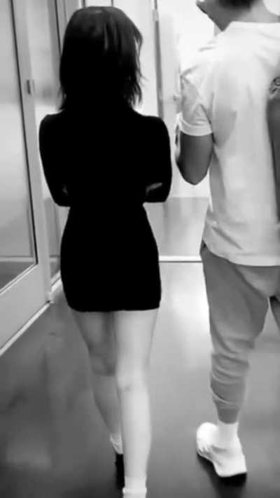 From behind
