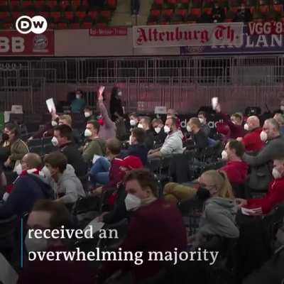Bayern's General Assembly descending into chaos over the Qatar Airways sponsorship. The fans chant "We are Bayern. You are not Bayern."