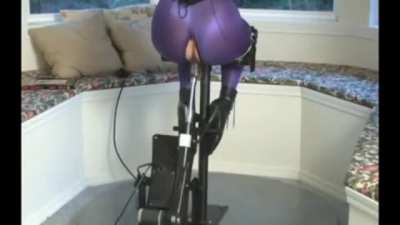 She can only squirm and squeeze her thighs together. There is no escape. The machine will not stop.
