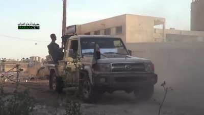 FSA Toyota ZU-23-2 technical laying rounds into Syrian Army positions - Daraa al-Balad - 5/23/2013