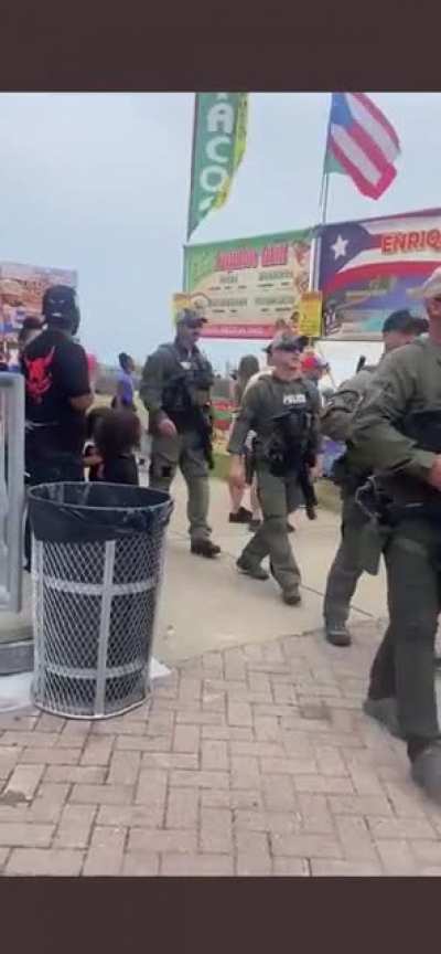 LMPD SWAT parades thru WorldFest. PIO claims they were just &ldquo;getting food&rdquo;. Is this how our PD builds/maintains relations &amp;amp; trust with the community? Or just another intimidation tactic?