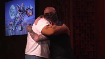 This man cries after meeting his hero: Dwayne "The Rock" Johnson, when Dwayne Johnson and Jimmy Fallon wore mascot versions of themselves to surprise fans at Universal Studios.