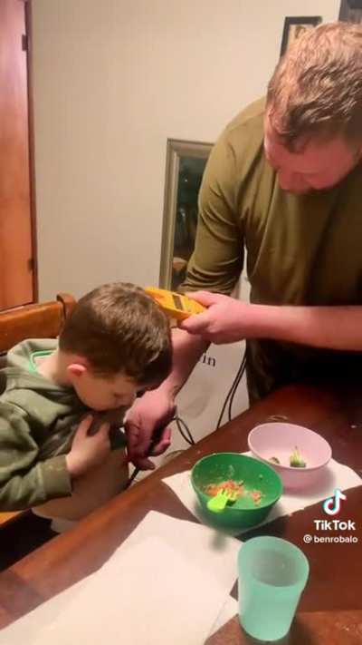Testing to see if he has more room in his stomach for food.