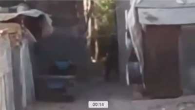 Merkava engages hamas milatant taking aim with an RPG